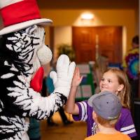 cat in the hat giving high five